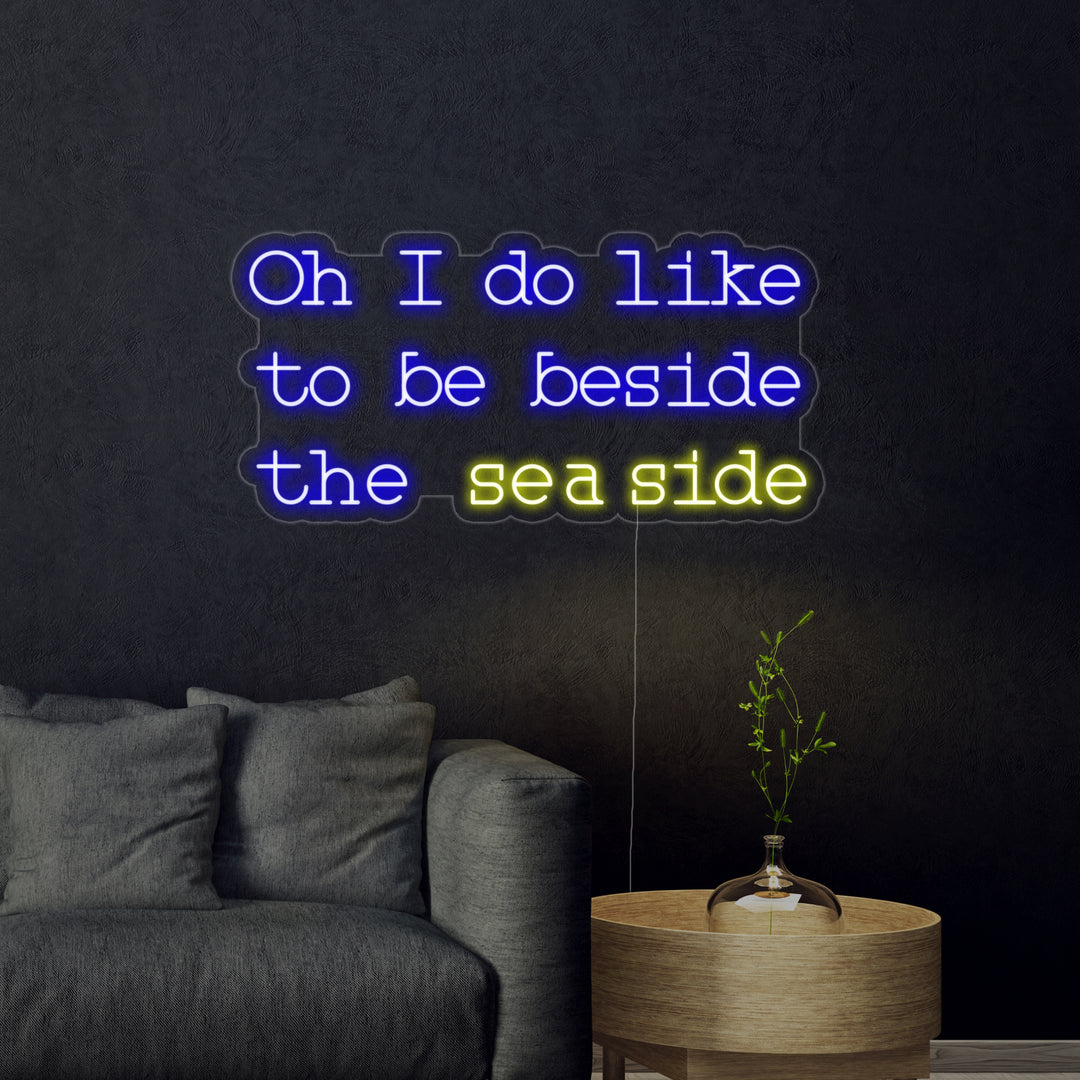 "Oh I do like to be beside the seaside" Neonschrift
