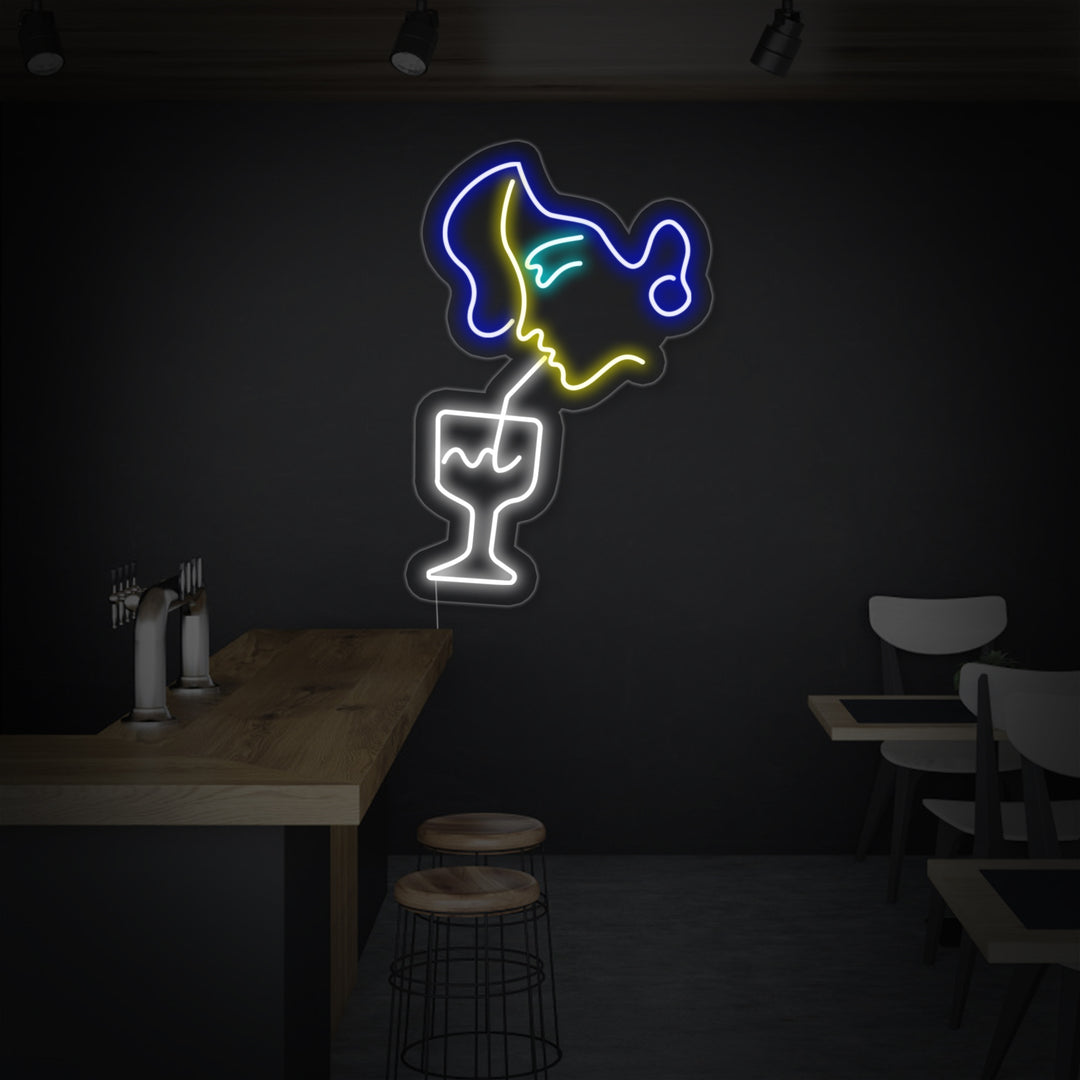 "Frauen, Trinken" Neonschrift
