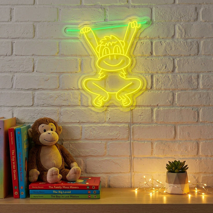 "Schaukelnder Affe" Neonschild