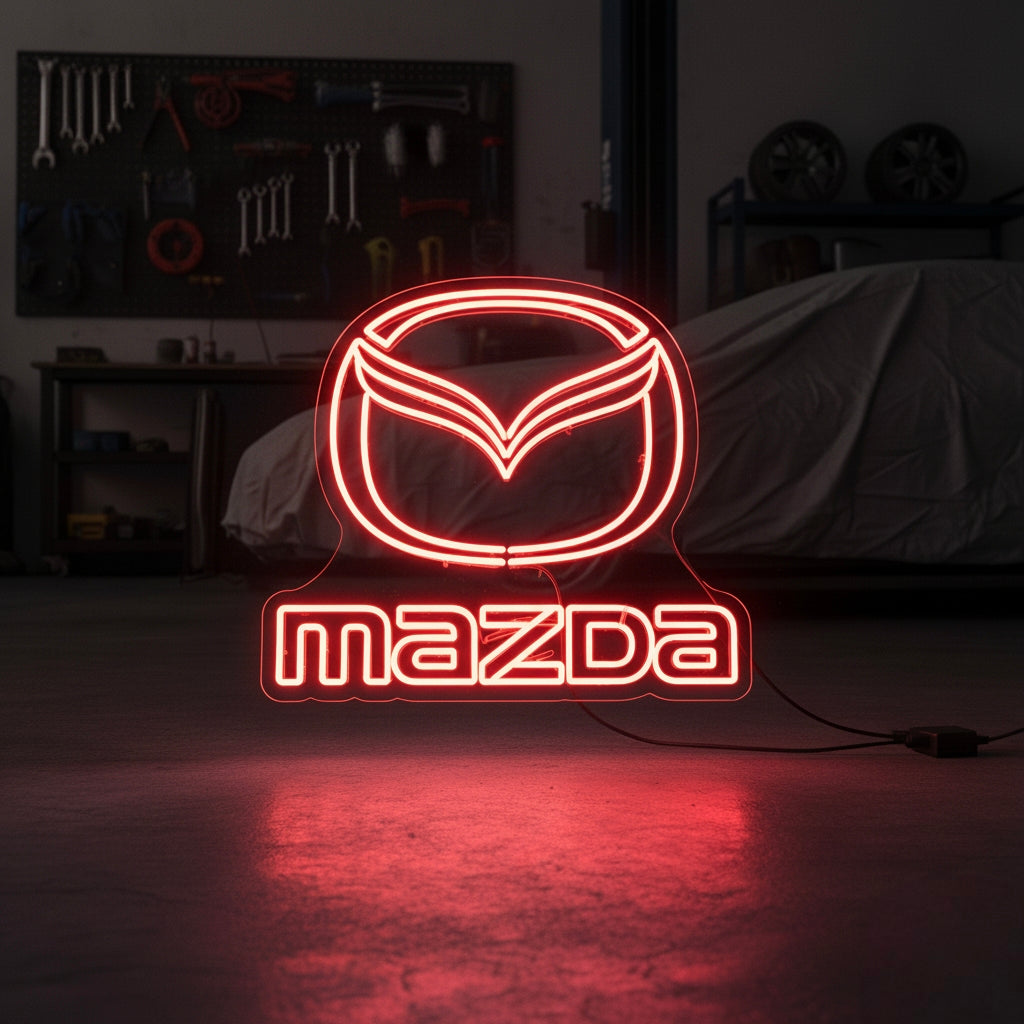 Red Mazda neon sign with circular wings logo and text, great for Japanese car enthusiasts and garage walls.