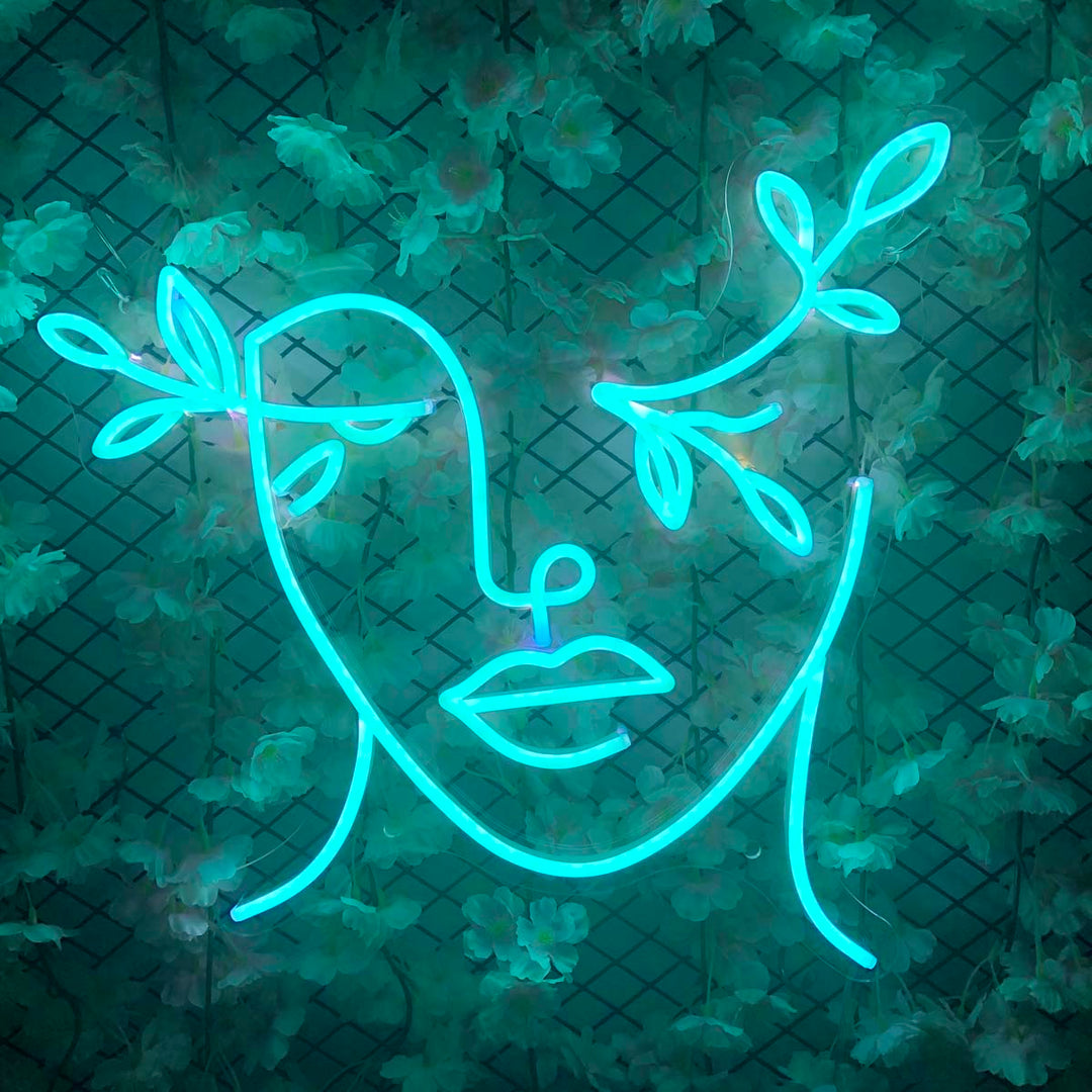 "Blätter, Frau Gesicht" Neonschrift